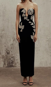 KORSETT-MIDIKLEID MIT PAILLETTEN UND CUT-OUTS IN SCHWARZ